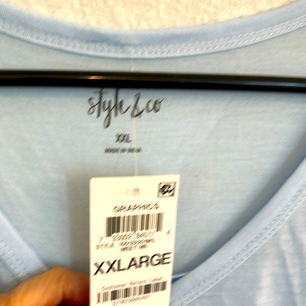 Women’s baby blue tee top - never been worn- with cuffed cap sleeves